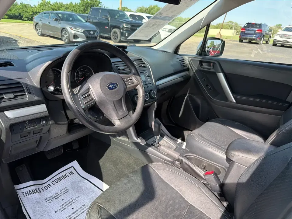 2015 Subaru Forester 2.5i Premium (JF2SJADC8FH) with an 2.5L H-4 DOHC engine, 6-Speed Automatic transmission, located at 1184 Kauffman Ave, Fairborn, OH, 45324, (937) 908-9800, 39.807072, -84.030914 - Weekend getaways to Hocking Hills, snowy commutes up I75, or everyday school-drop and grocery runs around Vandalia-this 2015 Subaru Forester 2.5i Premium is built for the kind of Ohio life that doesn't slow down when the weather changes. With Subaru practicality, a roomy hatchback-style cargo area, - Photo#9