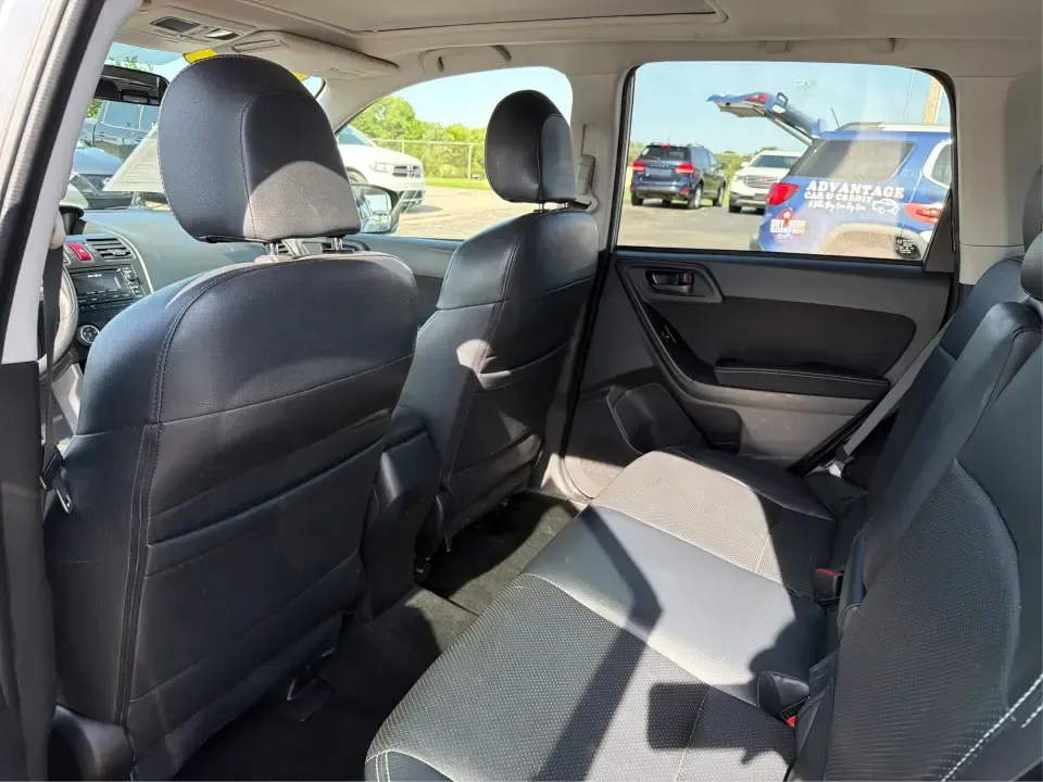 2015 Subaru Forester 2.5i Premium (JF2SJADC8FH) with an 2.5L H-4 DOHC engine, 6-Speed Automatic transmission, located at 1184 Kauffman Ave, Fairborn, OH, 45324, (937) 908-9800, 39.807072, -84.030914 - Weekend getaways to Hocking Hills, snowy commutes up I75, or everyday school-drop and grocery runs around Vandalia-this 2015 Subaru Forester 2.5i Premium is built for the kind of Ohio life that doesn't slow down when the weather changes. With Subaru practicality, a roomy hatchback-style cargo area, - Photo#10