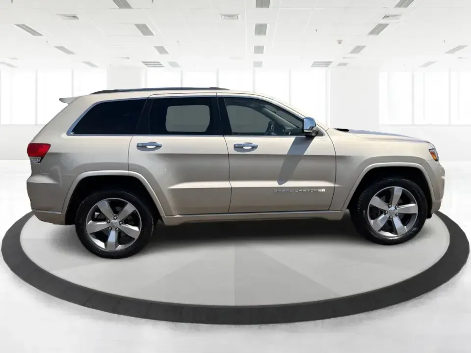 2014 Jeep Grand Cherokee Overland (1C4RJFCTXEC) with an 5.7L V8 OHV 16V engine, 5-Speed Automatic transmission, located at 1230 East Main St, Xenia, OH, 45385, (937) 908-9800, 39.688026, -83.910172 - Picture your next weekend: loading up for a road trip to Yellow Springs, cruising I675 with the family in comfort, or heading out to the trails and backroads around Wright-Patterson Air Force Base with the confidence of 4WD. This 2014 Jeep Grand Cherokee Overland is built for drivers who want a refi - Photo#1