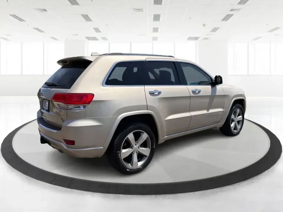 2014 Jeep Grand Cherokee Overland (1C4RJFCTXEC) with an 5.7L V8 OHV 16V engine, 5-Speed Automatic transmission, located at 1230 East Main St, Xenia, OH, 45385, (937) 908-9800, 39.688026, -83.910172 - Picture your next weekend: loading up for a road trip to Yellow Springs, cruising I675 with the family in comfort, or heading out to the trails and backroads around Wright-Patterson Air Force Base with the confidence of 4WD. This 2014 Jeep Grand Cherokee Overland is built for drivers who want a refi - Photo#2