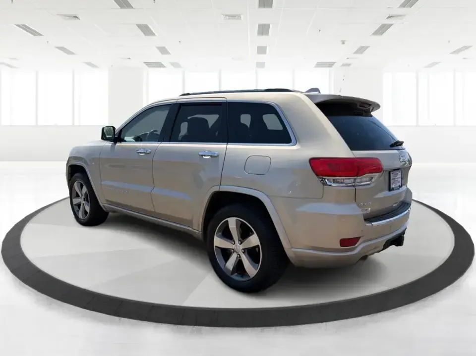 2014 Jeep Grand Cherokee Overland (1C4RJFCTXEC) with an 5.7L V8 OHV 16V engine, 5-Speed Automatic transmission, located at 1230 East Main St, Xenia, OH, 45385, (937) 908-9800, 39.688026, -83.910172 - Picture your next weekend: loading up for a road trip to Yellow Springs, cruising I675 with the family in comfort, or heading out to the trails and backroads around Wright-Patterson Air Force Base with the confidence of 4WD. This 2014 Jeep Grand Cherokee Overland is built for drivers who want a refi - Photo#4