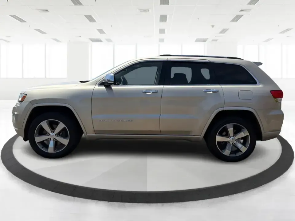 2014 Jeep Grand Cherokee Overland (1C4RJFCTXEC) with an 5.7L V8 OHV 16V engine, 5-Speed Automatic transmission, located at 1230 East Main St, Xenia, OH, 45385, (937) 908-9800, 39.688026, -83.910172 - Picture your next weekend: loading up for a road trip to Yellow Springs, cruising I675 with the family in comfort, or heading out to the trails and backroads around Wright-Patterson Air Force Base with the confidence of 4WD. This 2014 Jeep Grand Cherokee Overland is built for drivers who want a refi - Photo#5