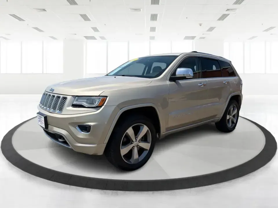 2014 Jeep Grand Cherokee Overland (1C4RJFCTXEC) with an 5.7L V8 OHV 16V engine, 5-Speed Automatic transmission, located at 1230 East Main St, Xenia, OH, 45385, (937) 908-9800, 39.688026, -83.910172 - Picture your next weekend: loading up for a road trip to Yellow Springs, cruising I675 with the family in comfort, or heading out to the trails and backroads around Wright-Patterson Air Force Base with the confidence of 4WD. This 2014 Jeep Grand Cherokee Overland is built for drivers who want a refi - Photo#8