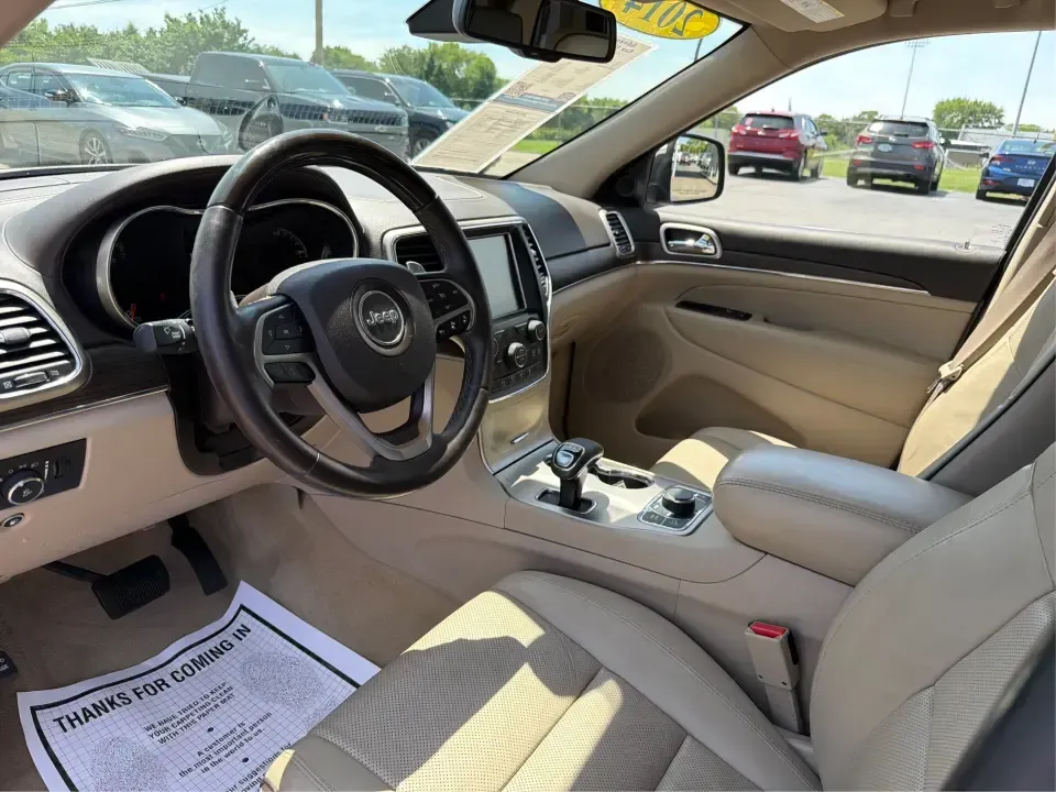 2014 Jeep Grand Cherokee Overland (1C4RJFCTXEC) with an 5.7L V8 OHV 16V engine, 5-Speed Automatic transmission, located at 1230 East Main St, Xenia, OH, 45385, (937) 908-9800, 39.688026, -83.910172 - Picture your next weekend: loading up for a road trip to Yellow Springs, cruising I675 with the family in comfort, or heading out to the trails and backroads around Wright-Patterson Air Force Base with the confidence of 4WD. This 2014 Jeep Grand Cherokee Overland is built for drivers who want a refi - Photo#9