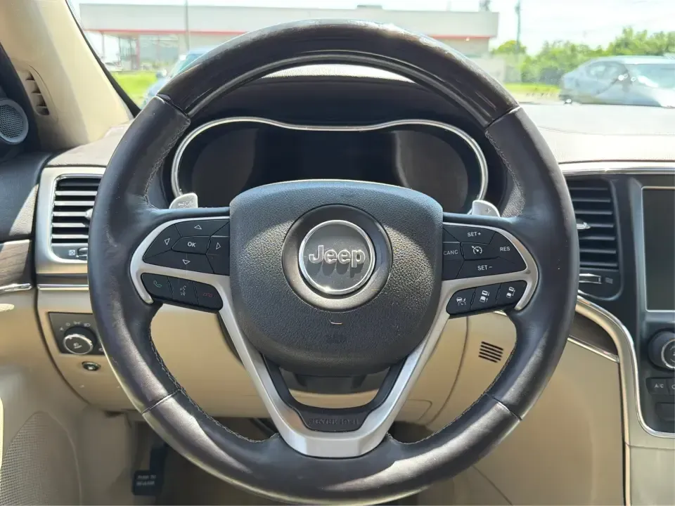 2014 Jeep Grand Cherokee Overland (1C4RJFCTXEC) with an 5.7L V8 OHV 16V engine, 5-Speed Automatic transmission, located at 1230 East Main St, Xenia, OH, 45385, (937) 908-9800, 39.688026, -83.910172 - Picture your next weekend: loading up for a road trip to Yellow Springs, cruising I675 with the family in comfort, or heading out to the trails and backroads around Wright-Patterson Air Force Base with the confidence of 4WD. This 2014 Jeep Grand Cherokee Overland is built for drivers who want a refi - Photo#16