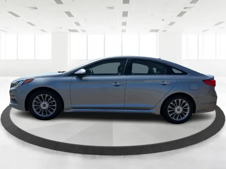 2015 Hyundai Sonata Limited (5NPE34AF9FH) with an 2.4L I-4 gasoline direct injection engine, 6-Speed Automatic transmission, located at 1184 Kauffman Ave, Fairborn, OH, 45324, (937) 908-9800, 39.807072, -84.030914 - Need a comfortable, tech-savvy sedan that makes the daily commute to Wright-Patterson AFB, a quick run down I-675, or a weekend drive to Yellow Springs feel like an upgrade-without stepping into a brand-new payment? This 2015 Hyundai Sonata Limited is built for real life in Fairborn: smooth on long - Photo#5