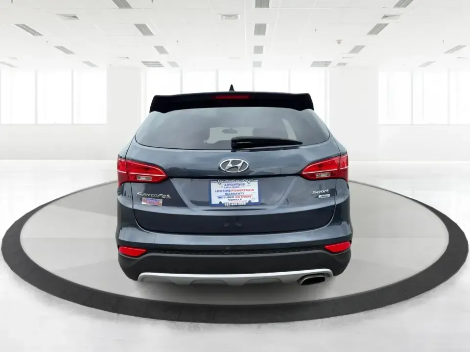 2015 Hyundai Santa Fe 2.4L (5XYZTDLB6FG) with an Theta II 2.4L I-4 gasoline direct injection engine, 6-Speed Automatic transmission, located at 401 Woodman Dr, Riverside, OH, 45431, (937) 908-9800, 39.760899, -84.123421 - Need one SUV that can handle school drop-offs, weekday commutes, and the occasional weekend escape to Eastwood MetroPark or a day trip down I-75? This 2015 Hyundai Santa Fe 2.4L in Mineral Gray fits that real-life rhythm with confident SUV versatility, family-friendly space, and comfort features tha - Photo#3