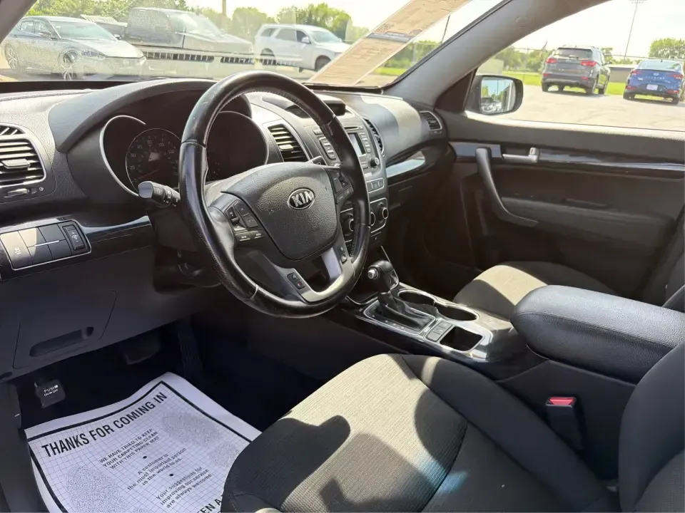 2014 Kia Sorento LX (5XYKT3A68EG) with an 2.4L I-4 gasoline direct injection engine, 6-Speed Automatic transmission, located at 1099 N County Rd 25A, Troy, OH, 45373, (937) 908-9800, 40.057079, -84.212883 - Need an SUV that fits real life in Troy-school drop-offs, a long commute down I-75, and weekend runs to Charleston Falls Preserve or a day around Downtown Troy? This 2014 Kia Sorento LX in Ebony Black is a practical, road-trip-ready SUV that balances everyday comfort with the kind of space and versa - Photo#9