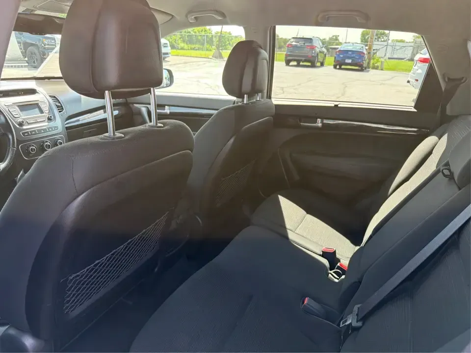 2014 Kia Sorento LX (5XYKT3A68EG) with an 2.4L I-4 gasoline direct injection engine, 6-Speed Automatic transmission, located at 1099 N County Rd 25A, Troy, OH, 45373, (937) 908-9800, 40.057079, -84.212883 - Need an SUV that fits real life in Troy-school drop-offs, a long commute down I-75, and weekend runs to Charleston Falls Preserve or a day around Downtown Troy? This 2014 Kia Sorento LX in Ebony Black is a practical, road-trip-ready SUV that balances everyday comfort with the kind of space and versa - Photo#10