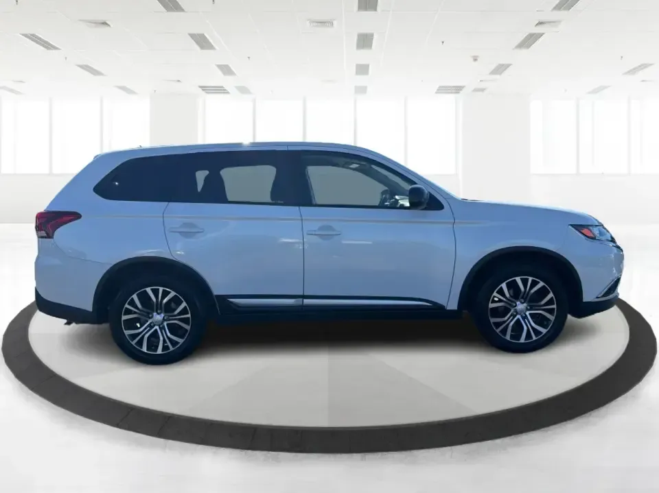 2016 Mitsubishi Outlander ES (JA4AD2A30GZ) with an 2.4L I-4 variable valve control engine, CVT transmission, located at 8750 N County Rd 25A, Piqua, OH, 45356, (937) 908-9800, 40.164391, -84.232513 - Weekend road trips to Indian Lake, daily commutes down I75, or shuttling kids between practice and school-this 2016 Mitsubishi Outlander ES is built for real-life schedules in and around Piqua, Ohio. Finished in Diamond White Pearl, this versatile SUV blends family-friendly space with easy-to-live-w - Photo#1