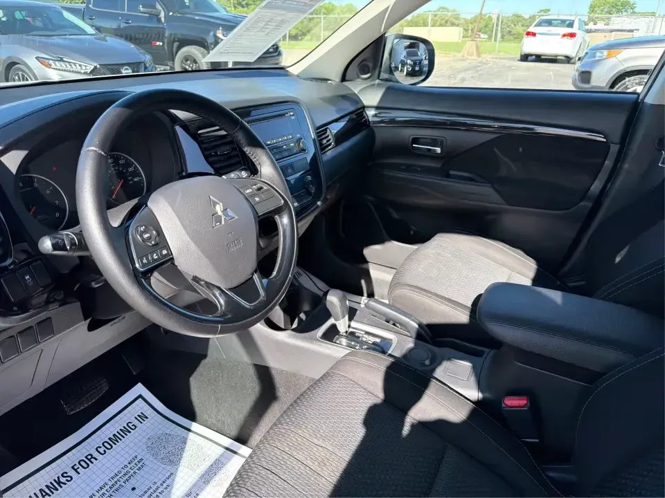 2016 Mitsubishi Outlander ES (JA4AD2A30GZ) with an 2.4L I-4 variable valve control engine, CVT transmission, located at 8750 N County Rd 25A, Piqua, OH, 45356, (937) 908-9800, 40.164391, -84.232513 - Weekend road trips to Indian Lake, daily commutes down I75, or shuttling kids between practice and school-this 2016 Mitsubishi Outlander ES is built for real-life schedules in and around Piqua, Ohio. Finished in Diamond White Pearl, this versatile SUV blends family-friendly space with easy-to-live-w - Photo#9