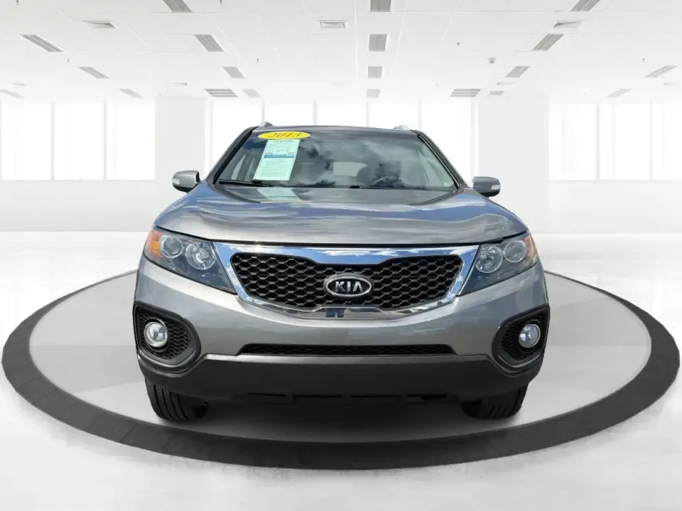 2013 Kia Sorento LX 2WD (5XYKT3A69DG) with an 2.4L L4 DOHC 16V engine, 6-Speed Automatic transmission, located at 8750 N County Rd 25A, Piqua, OH, 45356, (937) 908-9800, 40.164391, -84.232513 - Pack up the kids, load the cooler, and point your weekend plans toward Indian Lake or a quick getaway down I-75-this 2013 Kia Sorento LX 2WD is the kind of practical SUV that fits real life in Piqua. With roomy seating, flexible cargo space, and everyday comfort, it's a smart pick for growing famili - Photo#7