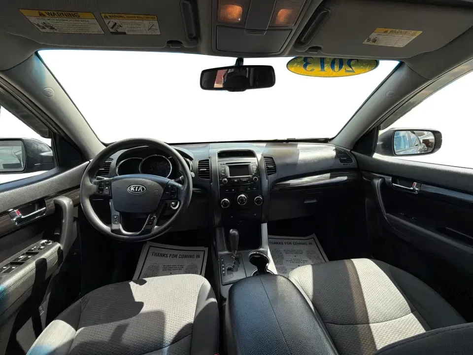 2013 Kia Sorento LX 2WD (5XYKT3A69DG) with an 2.4L L4 DOHC 16V engine, 6-Speed Automatic transmission, located at 8750 N County Rd 25A, Piqua, OH, 45356, (937) 908-9800, 40.164391, -84.232513 - Pack up the kids, load the cooler, and point your weekend plans toward Indian Lake or a quick getaway down I-75-this 2013 Kia Sorento LX 2WD is the kind of practical SUV that fits real life in Piqua. With roomy seating, flexible cargo space, and everyday comfort, it's a smart pick for growing famili - Photo#21
