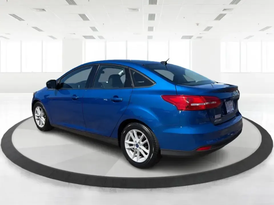 2018 Ford Focus SE (1FADP3F22JL) with an 2.0L L4 DOHC 16V engine, Automatic transmission, located at 4508 South Dixie Dr, Moraine, OH, 45439, (937) 908-9800, 39.689976, -84.218452 - Need a smart, efficient sedan for daily commutes down South Dixie Drive, quick runs to the Moraine Walmart area, or a reliable ride for work in Dayton and back? This 2018 Ford Focus SE is built for real life-easy to park, comfortable for longer drives, and fuel-friendly for the weekly grind. Finishe - Photo#4