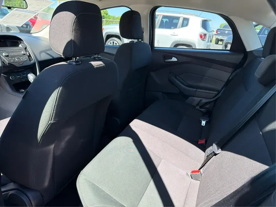 2018 Ford Focus SE (1FADP3F22JL) with an 2.0L L4 DOHC 16V engine, Automatic transmission, located at 4508 South Dixie Dr, Moraine, OH, 45439, (937) 908-9800, 39.689976, -84.218452 - Need a smart, efficient sedan for daily commutes down South Dixie Drive, quick runs to the Moraine Walmart area, or a reliable ride for work in Dayton and back? This 2018 Ford Focus SE is built for real life-easy to park, comfortable for longer drives, and fuel-friendly for the weekly grind. Finishe - Photo#10