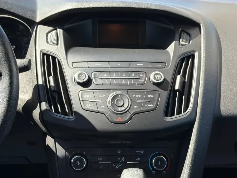 2018 Ford Focus SE (1FADP3F22JL) with an 2.0L L4 DOHC 16V engine, Automatic transmission, located at 4508 South Dixie Dr, Moraine, OH, 45439, (937) 908-9800, 39.689976, -84.218452 - Need a smart, efficient sedan for daily commutes down South Dixie Drive, quick runs to the Moraine Walmart area, or a reliable ride for work in Dayton and back? This 2018 Ford Focus SE is built for real life-easy to park, comfortable for longer drives, and fuel-friendly for the weekly grind. Finishe - Photo#13