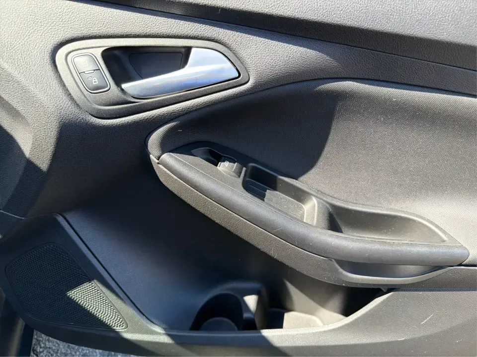 2018 Ford Focus SE (1FADP3F22JL) with an 2.0L L4 DOHC 16V engine, Automatic transmission, located at 4508 South Dixie Dr, Moraine, OH, 45439, (937) 908-9800, 39.689976, -84.218452 - Need a smart, efficient sedan for daily commutes down South Dixie Drive, quick runs to the Moraine Walmart area, or a reliable ride for work in Dayton and back? This 2018 Ford Focus SE is built for real life-easy to park, comfortable for longer drives, and fuel-friendly for the weekly grind. Finishe - Photo#19