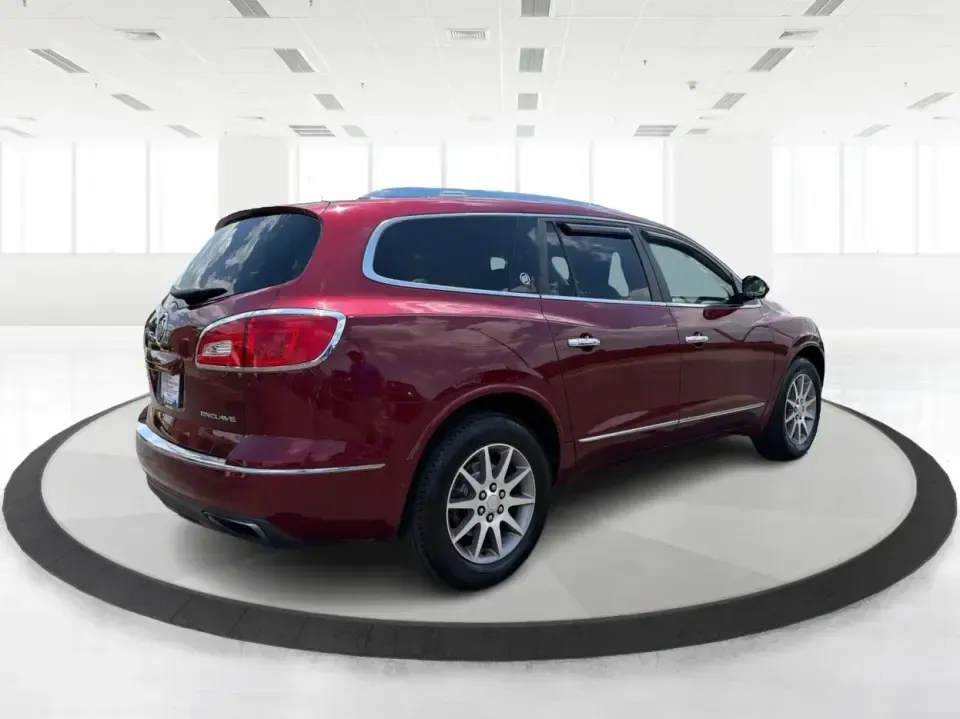 2015 Buick Enclave Leather AWD (5GAKVBKD9FJ) with an 3.6L V6 DOHC 24V engine, 6-Speed Automatic Overdrive transmission, located at 4508 South Dixie Dr, Moraine, OH, 45439, (937) 908-9800, 39.689976, -84.218452 - Road-trip weekends to Hueston Woods, school drop-offs around West Carrollton, and daily commutes up I75 feel a lot easier when your SUV has real space, comfort, and confidence in every season. This 2015 Buick Enclave Leather in stunning Crimson Red Tintcoat is built for busy families, carpool captai - Photo#2