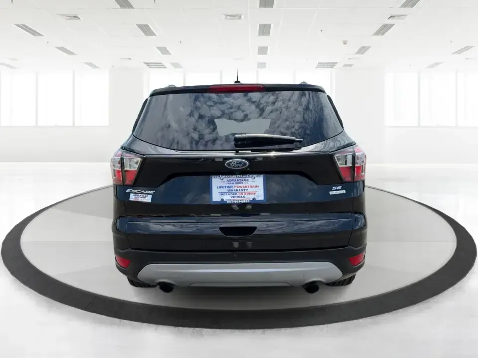 2017 Ford Escape SE (1FMCU0GD1HU) with an 1.5L L4 DOHC 16V engine, 6A transmission, located at 880 E. National Road, Vandalia, OH, 45377, (937) 908-9800, 39.891918, -84.183594 - Need a compact SUV that can handle the weekday commute on I75, school drop-offs around Troy, and spontaneous weekend getaways to Charleston Falls Preserve or a quick stroll through the Troy Strawberry Festival? This 2017 Ford Escape SE in Shadow Black is a practical, easy-to-live-with choice for bus - Photo#3
