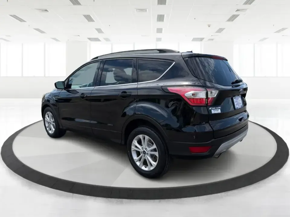 2017 Ford Escape SE (1FMCU0GD1HU) with an 1.5L L4 DOHC 16V engine, 6A transmission, located at 880 E. National Road, Vandalia, OH, 45377, (937) 908-9800, 39.891918, -84.183594 - Need a compact SUV that can handle the weekday commute on I75, school drop-offs around Troy, and spontaneous weekend getaways to Charleston Falls Preserve or a quick stroll through the Troy Strawberry Festival? This 2017 Ford Escape SE in Shadow Black is a practical, easy-to-live-with choice for bus - Photo#4