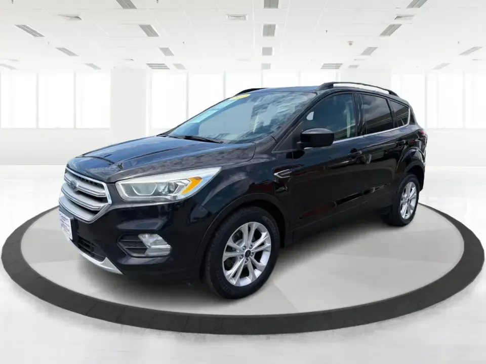 2017 Ford Escape SE (1FMCU0GD1HU) with an 1.5L L4 DOHC 16V engine, 6A transmission, located at 880 E. National Road, Vandalia, OH, 45377, (937) 908-9800, 39.891918, -84.183594 - Need a compact SUV that can handle the weekday commute on I75, school drop-offs around Troy, and spontaneous weekend getaways to Charleston Falls Preserve or a quick stroll through the Troy Strawberry Festival? This 2017 Ford Escape SE in Shadow Black is a practical, easy-to-live-with choice for bus - Photo#8
