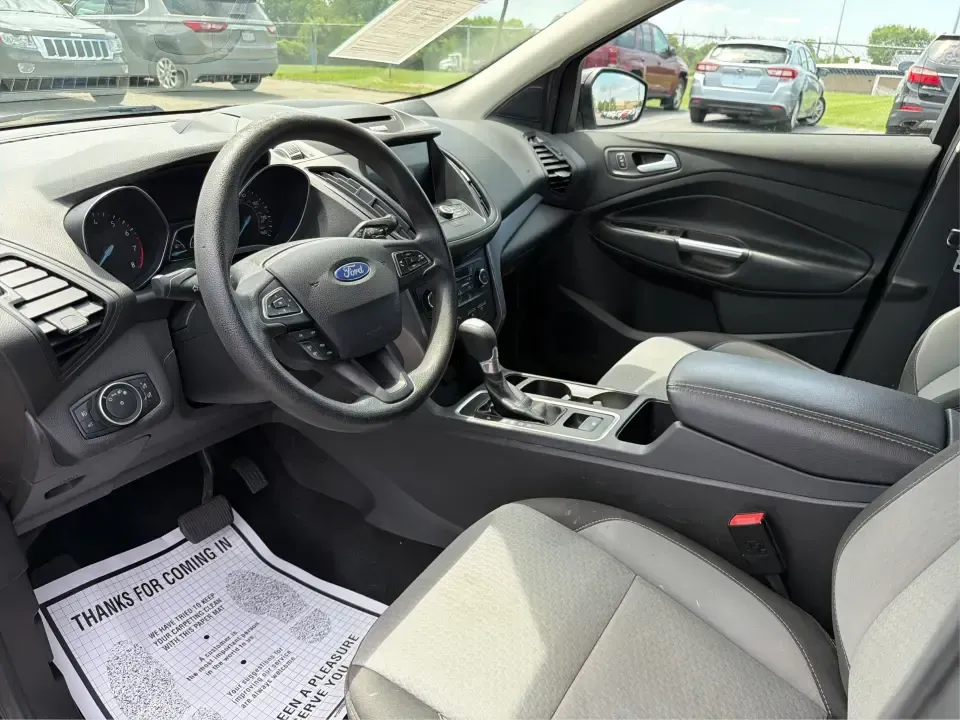 2017 Ford Escape SE (1FMCU0GD1HU) with an 1.5L L4 DOHC 16V engine, 6A transmission, located at 880 E. National Road, Vandalia, OH, 45377, (937) 908-9800, 39.891918, -84.183594 - Need a compact SUV that can handle the weekday commute on I75, school drop-offs around Troy, and spontaneous weekend getaways to Charleston Falls Preserve or a quick stroll through the Troy Strawberry Festival? This 2017 Ford Escape SE in Shadow Black is a practical, easy-to-live-with choice for bus - Photo#9