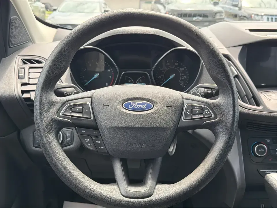 2017 Ford Escape SE (1FMCU0GD1HU) with an 1.5L L4 DOHC 16V engine, 6A transmission, located at 880 E. National Road, Vandalia, OH, 45377, (937) 908-9800, 39.891918, -84.183594 - Need a compact SUV that can handle the weekday commute on I75, school drop-offs around Troy, and spontaneous weekend getaways to Charleston Falls Preserve or a quick stroll through the Troy Strawberry Festival? This 2017 Ford Escape SE in Shadow Black is a practical, easy-to-live-with choice for bus - Photo#16