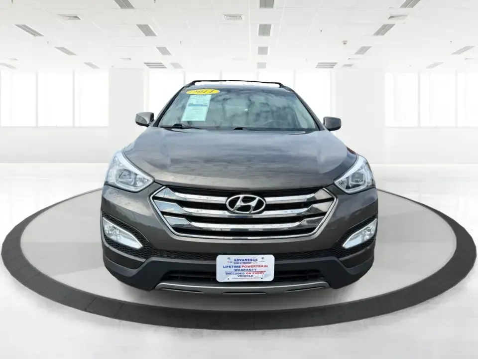 2014 Hyundai Santa Fe 2.4L (5XYZUDLB0EG) with an Theta II 2.4L I-4 gasoline direct injection engine, 6-Speed Automatic transmission, located at 4508 South Dixie Dr, Moraine, OH, 45439, (937) 908-9800, 39.689976, -84.218452 - Weekend road trips to Carillon Historical Park, snowy school-drop mornings, and everyday commuting down I75 or South Dixie Drive feel a lot easier when you've got a roomy SUV with confident traction and family-friendly comfort. This **2014 Hyundai Santa Fe 2.4L** in eye-catching **Cabo Bronze** is b - Photo#7