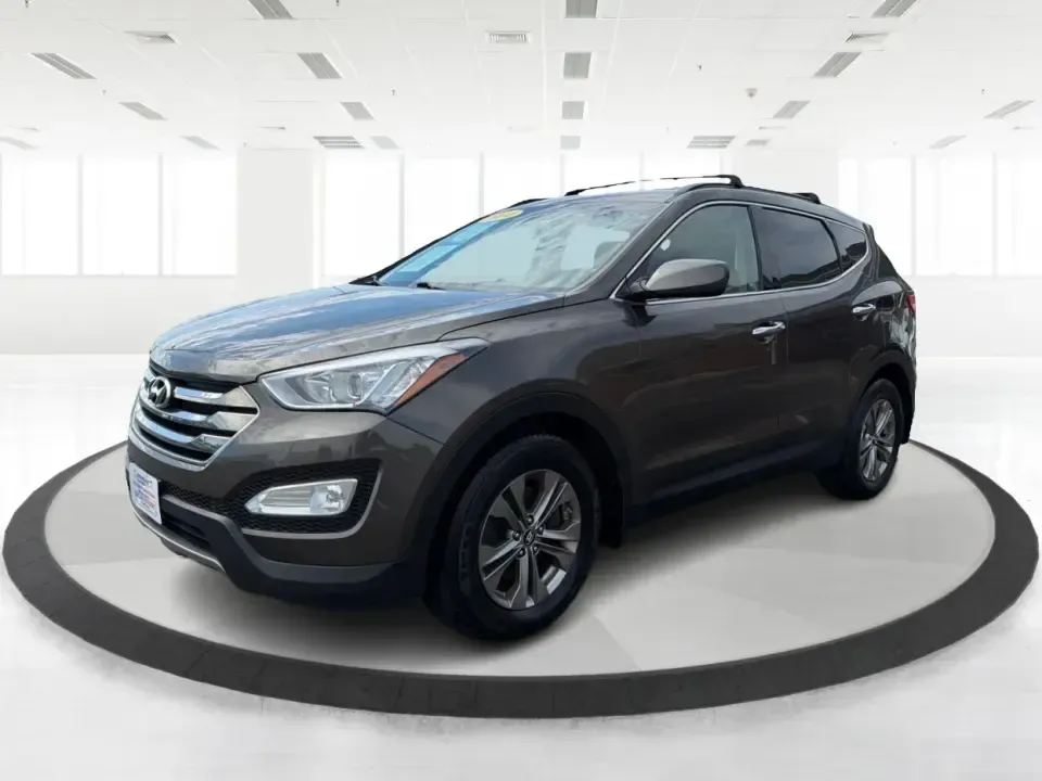 2014 Hyundai Santa Fe 2.4L (5XYZUDLB0EG) with an Theta II 2.4L I-4 gasoline direct injection engine, 6-Speed Automatic transmission, located at 4508 South Dixie Dr, Moraine, OH, 45439, (937) 908-9800, 39.689976, -84.218452 - Weekend road trips to Carillon Historical Park, snowy school-drop mornings, and everyday commuting down I75 or South Dixie Drive feel a lot easier when you've got a roomy SUV with confident traction and family-friendly comfort. This **2014 Hyundai Santa Fe 2.4L** in eye-catching **Cabo Bronze** is b - Photo#8