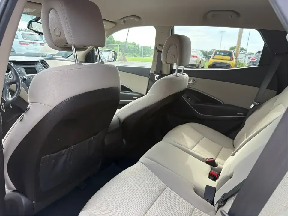 2014 Hyundai Santa Fe 2.4L (5XYZUDLB0EG) with an Theta II 2.4L I-4 gasoline direct injection engine, 6-Speed Automatic transmission, located at 4508 South Dixie Dr, Moraine, OH, 45439, (937) 908-9800, 39.689976, -84.218452 - Weekend road trips to Carillon Historical Park, snowy school-drop mornings, and everyday commuting down I75 or South Dixie Drive feel a lot easier when you've got a roomy SUV with confident traction and family-friendly comfort. This **2014 Hyundai Santa Fe 2.4L** in eye-catching **Cabo Bronze** is b - Photo#10