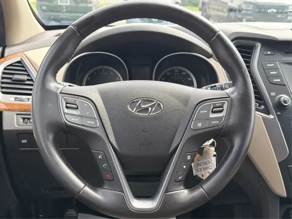 2014 Hyundai Santa Fe 2.4L (5XYZUDLB0EG) with an Theta II 2.4L I-4 gasoline direct injection engine, 6-Speed Automatic transmission, located at 4508 South Dixie Dr, Moraine, OH, 45439, (937) 908-9800, 39.689976, -84.218452 - Weekend road trips to Carillon Historical Park, snowy school-drop mornings, and everyday commuting down I75 or South Dixie Drive feel a lot easier when you've got a roomy SUV with confident traction and family-friendly comfort. This **2014 Hyundai Santa Fe 2.4L** in eye-catching **Cabo Bronze** is b - Photo#16