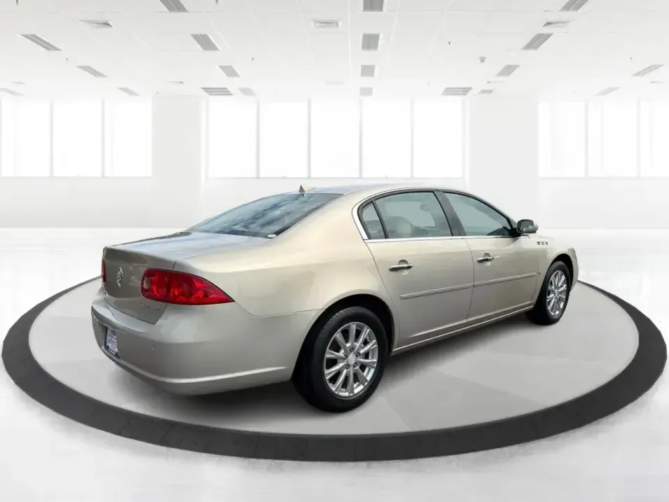 2009 Buick Lucerne CXL1 (1G4HD57M99U) with an 3.9L V6 OHV 12V engine, 4-Speed Automatic transmission, located at 4508 South Dixie Dr, Moraine, OH, 45439, (937) 908-9800, 39.689976, -84.218452 - Dreaming of a comfortable, quiet sedan for long commutes down I75, school drop-offs around Moraine, or easy weekend cruises to Carillon Historical Park and the Dayton Art Institute? This 2009 Buick Lucerne CXL is built for drivers who want classic full-size comfort, a smooth V6 ride, and upscale fea - Photo#2