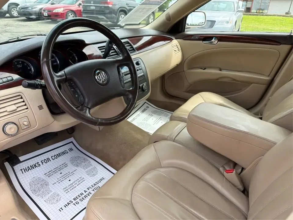 2009 Buick Lucerne CXL1 (1G4HD57M99U) with an 3.9L V6 OHV 12V engine, 4-Speed Automatic transmission, located at 4508 South Dixie Dr, Moraine, OH, 45439, (937) 908-9800, 39.689976, -84.218452 - Dreaming of a comfortable, quiet sedan for long commutes down I75, school drop-offs around Moraine, or easy weekend cruises to Carillon Historical Park and the Dayton Art Institute? This 2009 Buick Lucerne CXL is built for drivers who want classic full-size comfort, a smooth V6 ride, and upscale fea - Photo#9