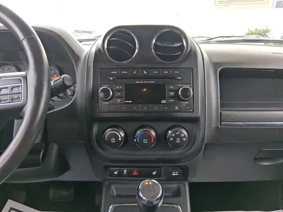 2016 Jeep Patriot Latitude (1C4NJRFB0GD) with an 2.4L L4 DOHC 16V engine, located at 1184 Kauffman Ave, Fairborn, OH, 45324, (937) 908-9800, 39.807072, -84.030914 - Weekend lake runs, snowy school mornings, and everyday commuting across the Miami Valley all get easier in a compact SUV that's ready when Ohio weather changes its mind. This **2016 Jeep Patriot Latitude 4WD** is a practical choice for drivers who want the Jeep look and capability in an affordable,- Photo#13