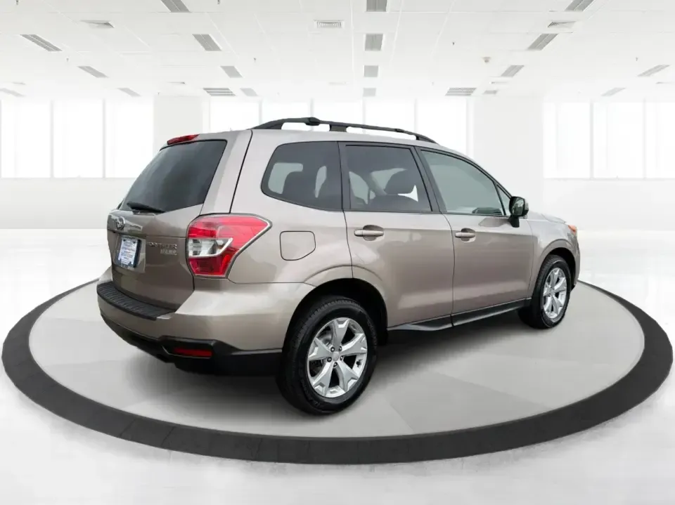 2015 Subaru Forester 2.5i Premium (JF2SJADC5FH) with an 2.5L H-4 DOHC engine, 6-Speed Automatic transmission, located at 401 Woodman Dr, Riverside, OH, 45431, (937) 908-9800, 39.760899, -84.123421 - Weekend hikes at nearby parks, snowy school-dropoff mornings, and road trips that start on I675 and end wherever the map takes you-this 2015 Subaru Forester 2.5i Premium is built for the Riverside, Ohio lifestyle. With Subaru's confident 4WD/AWD capability and a practical hatchback-style cargo area, - Photo#2