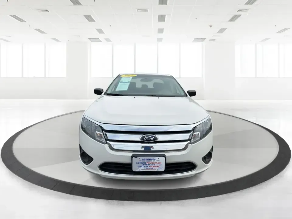 2012 Ford Fusion S (3FAHP0GA0CR) with an 2.5L I-4 DOHC engine, located at 1099 N County Rd 25A, Troy, OH, 45373, (937) 908-9800, 40.057079, -84.212883 - Need a reliable commuter that still feels comfortable for weekend errands, school drop-offs, and those quick road trips up I75? This 2012 Ford Fusion S is a smart, budget-friendly sedan for life in and around Troy-easy to park downtown, smooth on longer drives toward Dayton, and practical for everyd - Photo#7