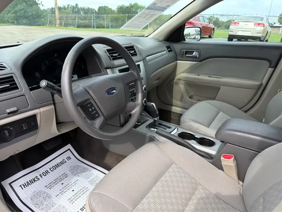 2012 Ford Fusion S (3FAHP0GA0CR) with an 2.5L I-4 DOHC engine, located at 1099 N County Rd 25A, Troy, OH, 45373, (937) 908-9800, 40.057079, -84.212883 - Need a reliable commuter that still feels comfortable for weekend errands, school drop-offs, and those quick road trips up I75? This 2012 Ford Fusion S is a smart, budget-friendly sedan for life in and around Troy-easy to park downtown, smooth on longer drives toward Dayton, and practical for everyd - Photo#9