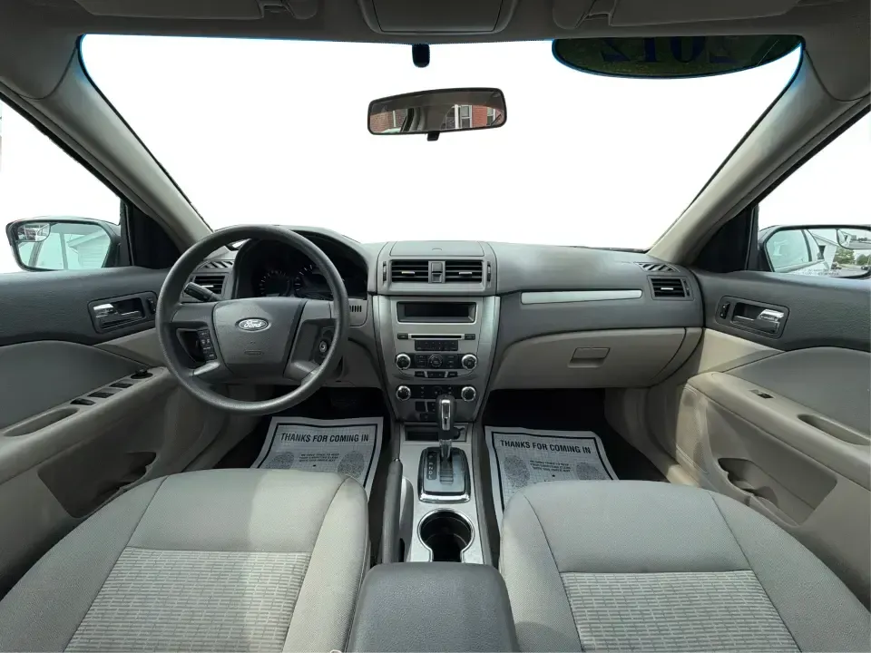 2012 Ford Fusion S (3FAHP0GA0CR) with an 2.5L I-4 DOHC engine, located at 1099 N County Rd 25A, Troy, OH, 45373, (937) 908-9800, 40.057079, -84.212883 - Need a reliable commuter that still feels comfortable for weekend errands, school drop-offs, and those quick road trips up I75? This 2012 Ford Fusion S is a smart, budget-friendly sedan for life in and around Troy-easy to park downtown, smooth on longer drives toward Dayton, and practical for everyd - Photo#21