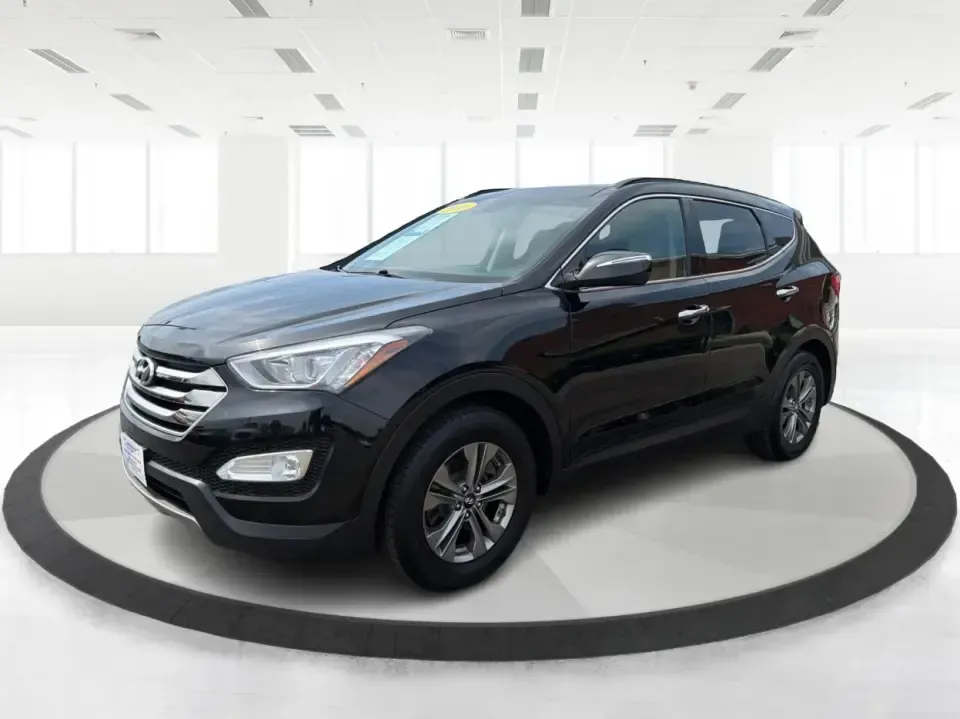 2016 Hyundai Santa Fe 2.4L (5XYZU3LB5GG) with an Theta II 2.4L I-4 gasoline direct injection engine, 6-Speed Automatic transmission, located at 1230 East Main St, Xenia, OH, 45385, (937) 908-9800, 39.688026, -83.910172 - Road-trip ready for Hocking Hills weekends, school-run practical for busy mornings, and comfortable enough for the daily commute down US-35-this 2016 Hyundai Santa Fe 2.4L is the kind of SUV that fits real life in and around Xenia, Ohio. Finished in Twilight Black, it delivers a confident, versatile - Photo#8