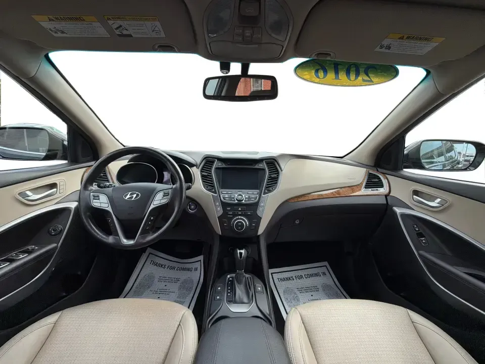 2016 Hyundai Santa Fe 2.4L (5XYZU3LB5GG) with an Theta II 2.4L I-4 gasoline direct injection engine, 6-Speed Automatic transmission, located at 1230 East Main St, Xenia, OH, 45385, (937) 908-9800, 39.688026, -83.910172 - Road-trip ready for Hocking Hills weekends, school-run practical for busy mornings, and comfortable enough for the daily commute down US-35-this 2016 Hyundai Santa Fe 2.4L is the kind of SUV that fits real life in and around Xenia, Ohio. Finished in Twilight Black, it delivers a confident, versatile - Photo#21