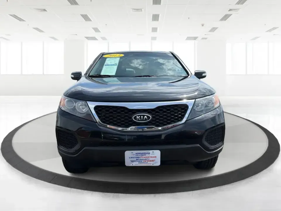 2013 Kia Sorento LX (5XYKTCA63DG) with an 2.4L I-4 gasoline direct injection engine, 6-Speed Automatic transmission, located at 1230 East Main St, Xenia, OH, 45385, (937) 908-9800, 39.688026, -83.910172 - Ready for school drop-offs, long commutes to Dayton, and spontaneous weekend getaways to John Bryan State Park, this 2013 Kia Sorento LX is the kind of SUV that fits real life in Greene County. With confident SUV versatility, a roomy cabin, and practical features for everyday comfort, it's a smart p - Photo#7