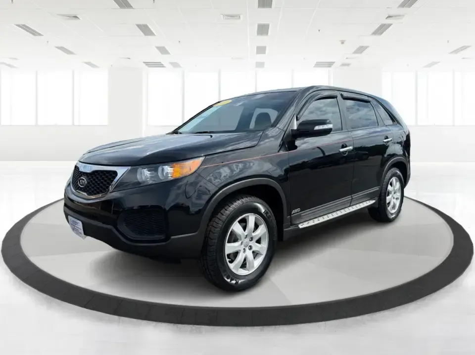 2013 Kia Sorento LX (5XYKTCA63DG) with an 2.4L I-4 gasoline direct injection engine, 6-Speed Automatic transmission, located at 1230 East Main St, Xenia, OH, 45385, (937) 908-9800, 39.688026, -83.910172 - Ready for school drop-offs, long commutes to Dayton, and spontaneous weekend getaways to John Bryan State Park, this 2013 Kia Sorento LX is the kind of SUV that fits real life in Greene County. With confident SUV versatility, a roomy cabin, and practical features for everyday comfort, it's a smart p - Photo#8