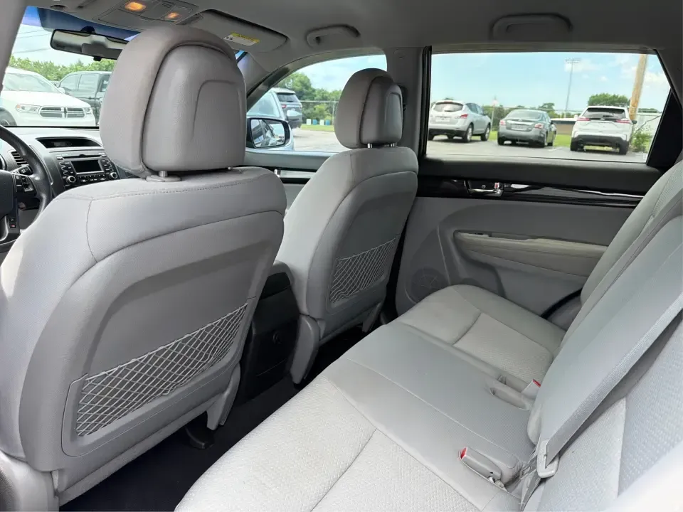 2013 Kia Sorento LX (5XYKTCA63DG) with an 2.4L I-4 gasoline direct injection engine, 6-Speed Automatic transmission, located at 1230 East Main St, Xenia, OH, 45385, (937) 908-9800, 39.688026, -83.910172 - Ready for school drop-offs, long commutes to Dayton, and spontaneous weekend getaways to John Bryan State Park, this 2013 Kia Sorento LX is the kind of SUV that fits real life in Greene County. With confident SUV versatility, a roomy cabin, and practical features for everyday comfort, it's a smart p - Photo#10