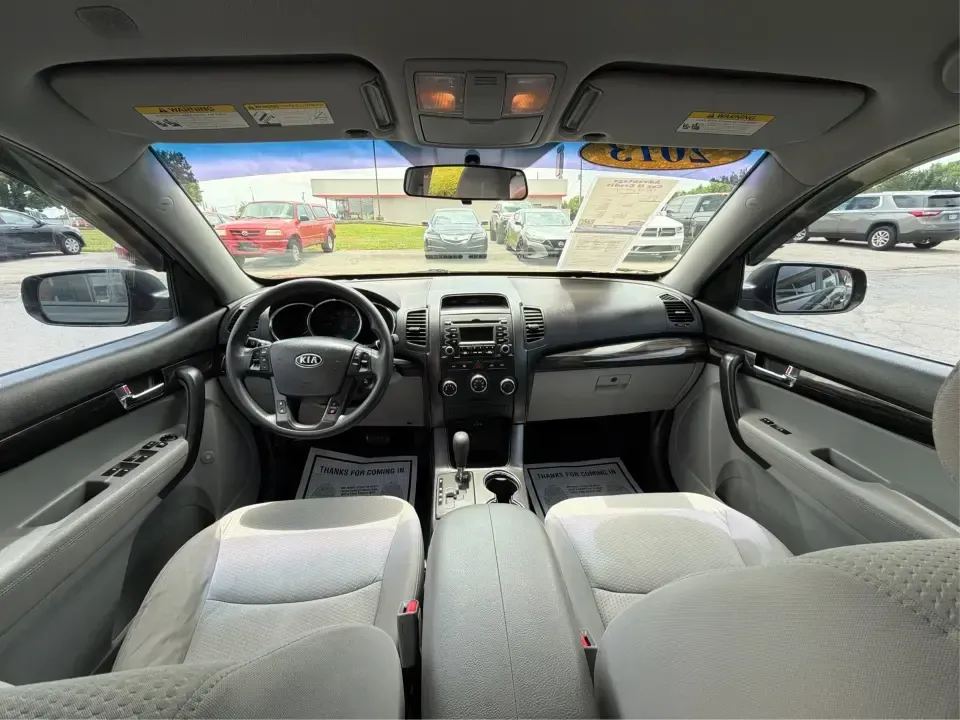 2013 Kia Sorento LX (5XYKTCA63DG) with an 2.4L I-4 gasoline direct injection engine, 6-Speed Automatic transmission, located at 1230 East Main St, Xenia, OH, 45385, (937) 908-9800, 39.688026, -83.910172 - Ready for school drop-offs, long commutes to Dayton, and spontaneous weekend getaways to John Bryan State Park, this 2013 Kia Sorento LX is the kind of SUV that fits real life in Greene County. With confident SUV versatility, a roomy cabin, and practical features for everyday comfort, it's a smart p - Photo#22