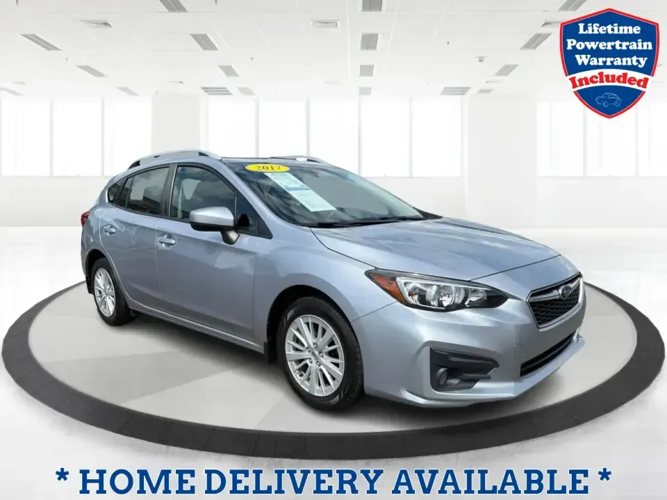 2017 Subaru Impreza 2.0i Premium (4S3GTAD62H3) with an 2L H-4 gasoline direct injection engine, CVT transmission, located at 1951 S Dayton Lakeview Rd., New Carlisle, OH, 45344, (937) 908-9800, 39.890999, -84.050255 - Picture a weekday commute from New Carlisle to Dayton, then a spontaneous weekend loop out toward Springfield-one vehicle that fits both lifestyles without feeling bulky or hard to park. This 2017 Subaru Impreza 2.0i Premium Hatchback in Ice Silver Metallic is a smart match for drivers who want year - Photo#0