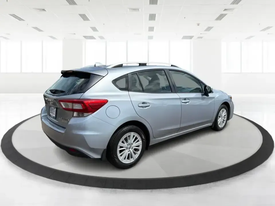 2017 Subaru Impreza 2.0i Premium (4S3GTAD62H3) with an 2L H-4 gasoline direct injection engine, CVT transmission, located at 1951 S Dayton Lakeview Rd., New Carlisle, OH, 45344, (937) 908-9800, 39.890999, -84.050255 - Picture a weekday commute from New Carlisle to Dayton, then a spontaneous weekend loop out toward Springfield-one vehicle that fits both lifestyles without feeling bulky or hard to park. This 2017 Subaru Impreza 2.0i Premium Hatchback in Ice Silver Metallic is a smart match for drivers who want year - Photo#2