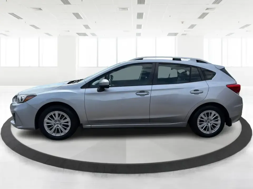 2017 Subaru Impreza 2.0i Premium (4S3GTAD62H3) with an 2L H-4 gasoline direct injection engine, CVT transmission, located at 1951 S Dayton Lakeview Rd., New Carlisle, OH, 45344, (937) 908-9800, 39.890999, -84.050255 - Picture a weekday commute from New Carlisle to Dayton, then a spontaneous weekend loop out toward Springfield-one vehicle that fits both lifestyles without feeling bulky or hard to park. This 2017 Subaru Impreza 2.0i Premium Hatchback in Ice Silver Metallic is a smart match for drivers who want year - Photo#5