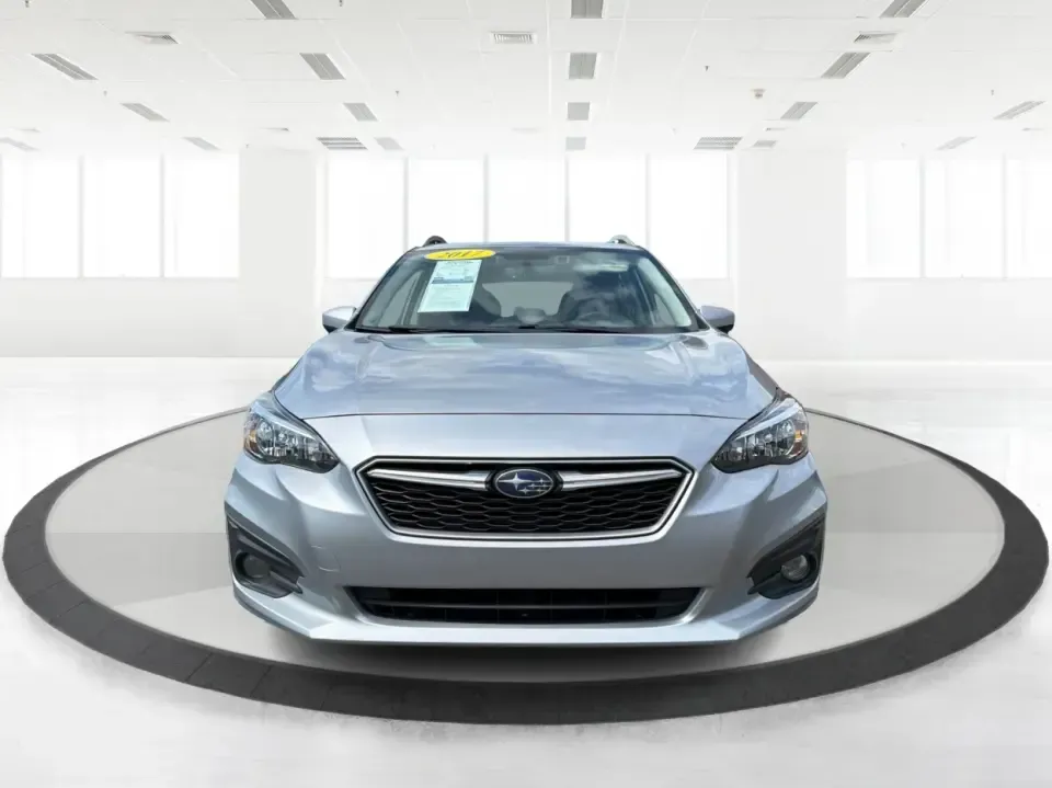 2017 Subaru Impreza 2.0i Premium (4S3GTAD62H3) with an 2L H-4 gasoline direct injection engine, CVT transmission, located at 1951 S Dayton Lakeview Rd., New Carlisle, OH, 45344, (937) 908-9800, 39.890999, -84.050255 - Picture a weekday commute from New Carlisle to Dayton, then a spontaneous weekend loop out toward Springfield-one vehicle that fits both lifestyles without feeling bulky or hard to park. This 2017 Subaru Impreza 2.0i Premium Hatchback in Ice Silver Metallic is a smart match for drivers who want year - Photo#7
