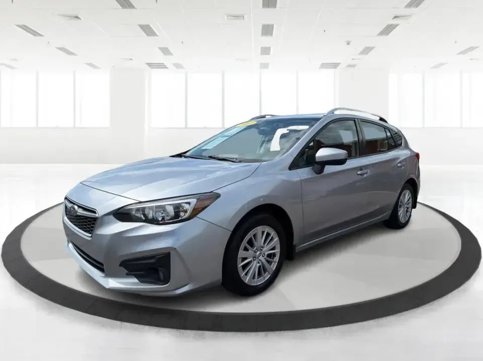 2017 Subaru Impreza 2.0i Premium (4S3GTAD62H3) with an 2L H-4 gasoline direct injection engine, CVT transmission, located at 1951 S Dayton Lakeview Rd., New Carlisle, OH, 45344, (937) 908-9800, 39.890999, -84.050255 - Picture a weekday commute from New Carlisle to Dayton, then a spontaneous weekend loop out toward Springfield-one vehicle that fits both lifestyles without feeling bulky or hard to park. This 2017 Subaru Impreza 2.0i Premium Hatchback in Ice Silver Metallic is a smart match for drivers who want year - Photo#8