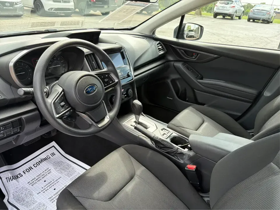2017 Subaru Impreza 2.0i Premium (4S3GTAD62H3) with an 2L H-4 gasoline direct injection engine, CVT transmission, located at 1951 S Dayton Lakeview Rd., New Carlisle, OH, 45344, (937) 908-9800, 39.890999, -84.050255 - Picture a weekday commute from New Carlisle to Dayton, then a spontaneous weekend loop out toward Springfield-one vehicle that fits both lifestyles without feeling bulky or hard to park. This 2017 Subaru Impreza 2.0i Premium Hatchback in Ice Silver Metallic is a smart match for drivers who want year - Photo#9